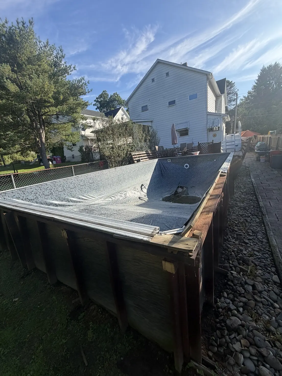 A 40-plus-year-old wooden swimming pool before demolition